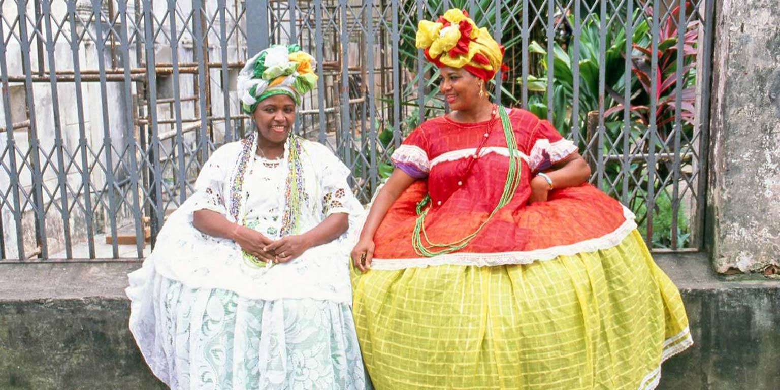 Two women in African costumes.