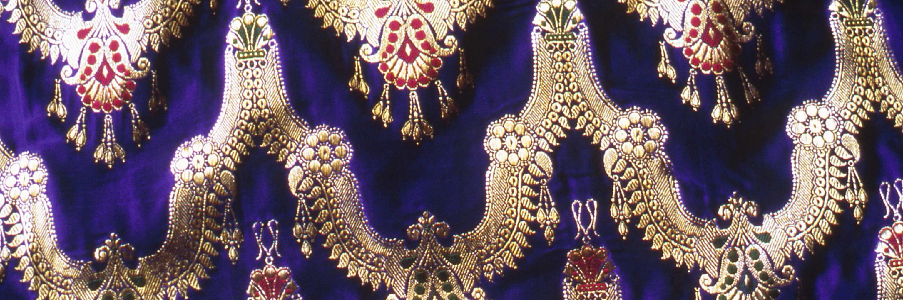 Close-up of intricate fabric embroidery. 