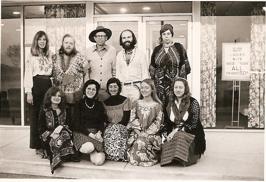 Front row, left to right: Sharon Sherman, Eleanor Wachs, Jean Folk Costume. Kaplan, Libby Tucker, Greta Swenson. Back row, left to right: Unknown, Dewey Reeves, Richard Dorson, Bill McCarthy, and Dewey Reeve's spouse.