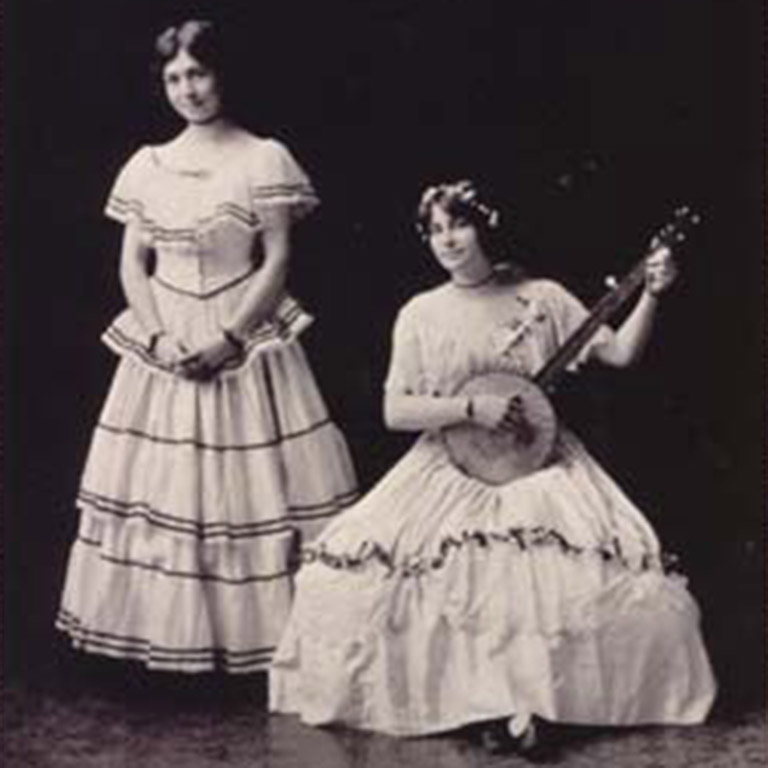 Black and white photo of two musicians. 